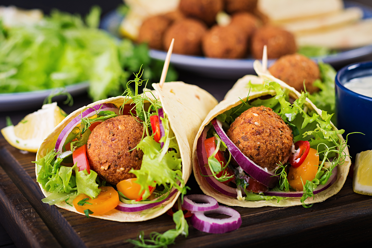Tortilla wrap with falafel and fresh salad