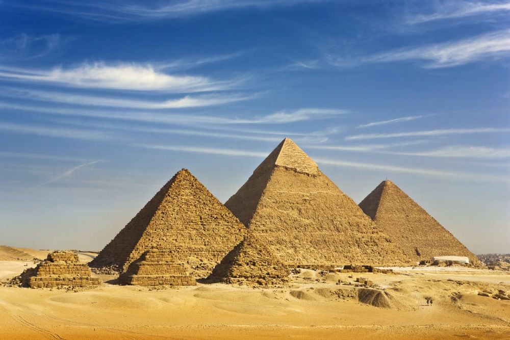 Egypt. Cairo - Giza. General view of pyramids from the Giza Plateau (there is three pyramids popularly known as Queens' Pyramids on front side; next in order from left