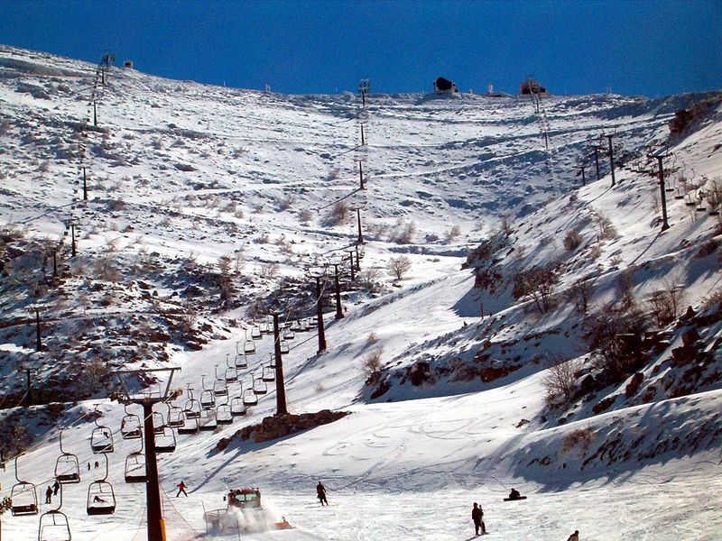 snowy slopes and cable cars