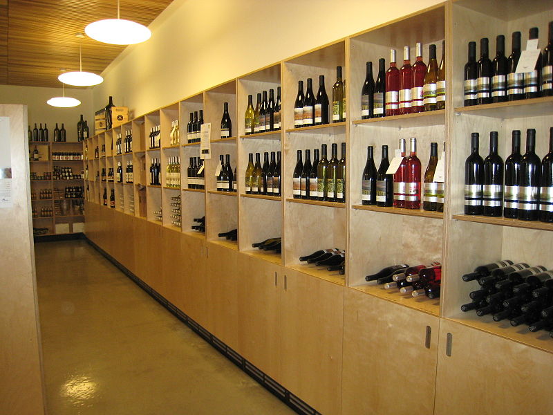 Shelves full of wine bottles