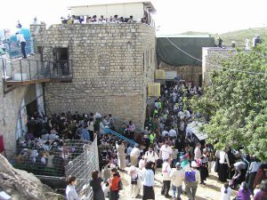 crowds around a large building