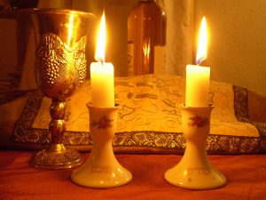 Kiddush cup, Shabbat candles and challah cover