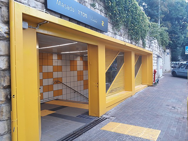 entrance to Carmelit’s Masada station, painted in yellow