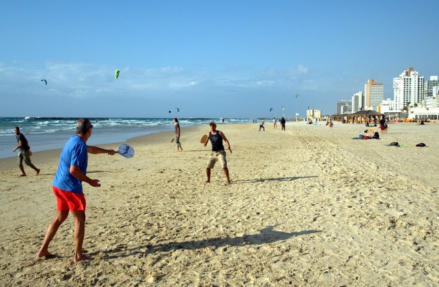 matkot players on the beach in Tel Aviv